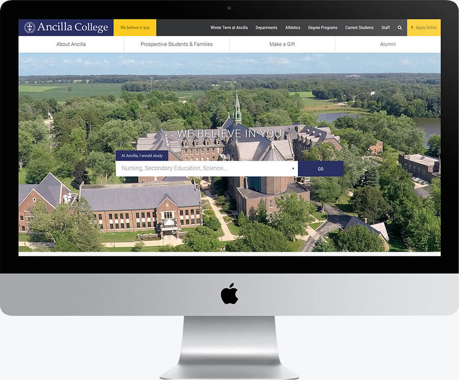 A desktop computer showing the hero section of the Ancilla College website